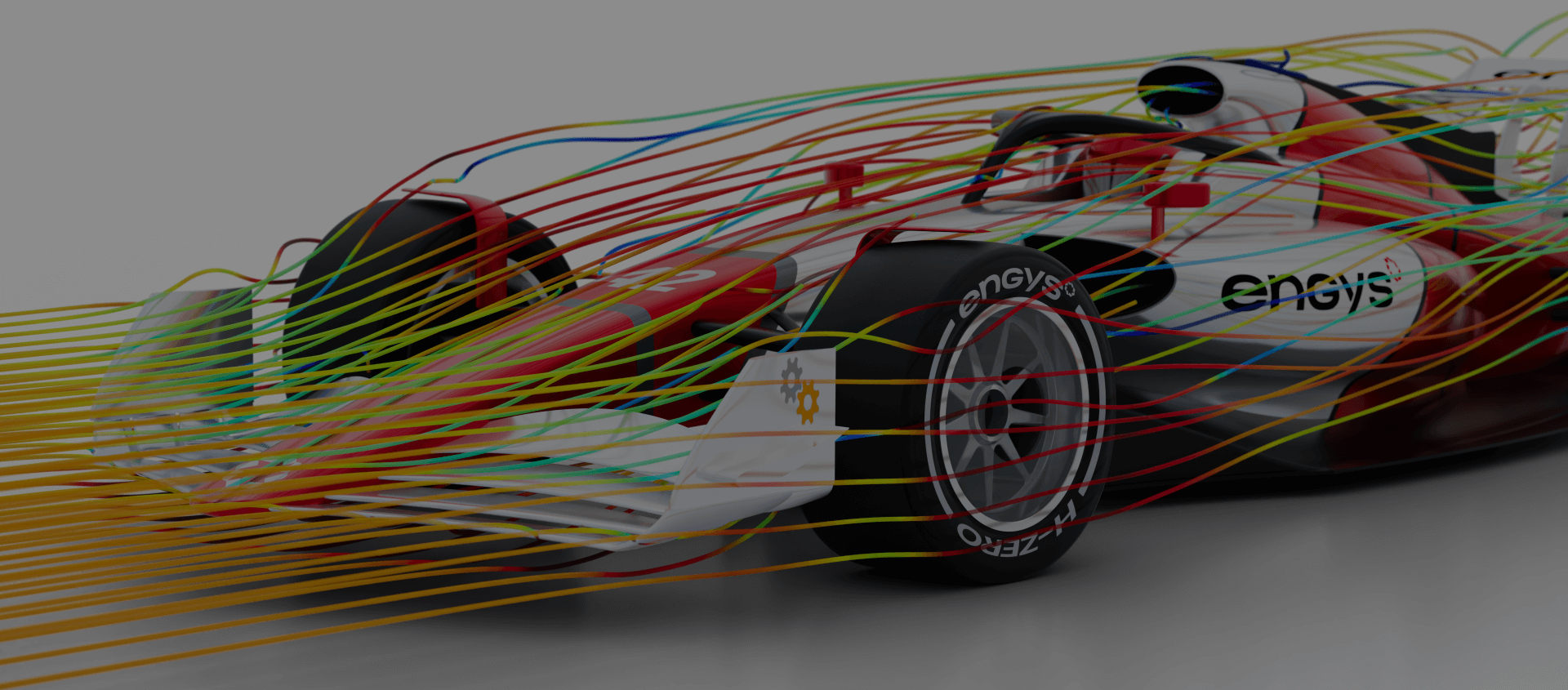 CFD simulation of an F1 car showcasing airflow streamlines for aerodynamic optimization using ENGYS software.