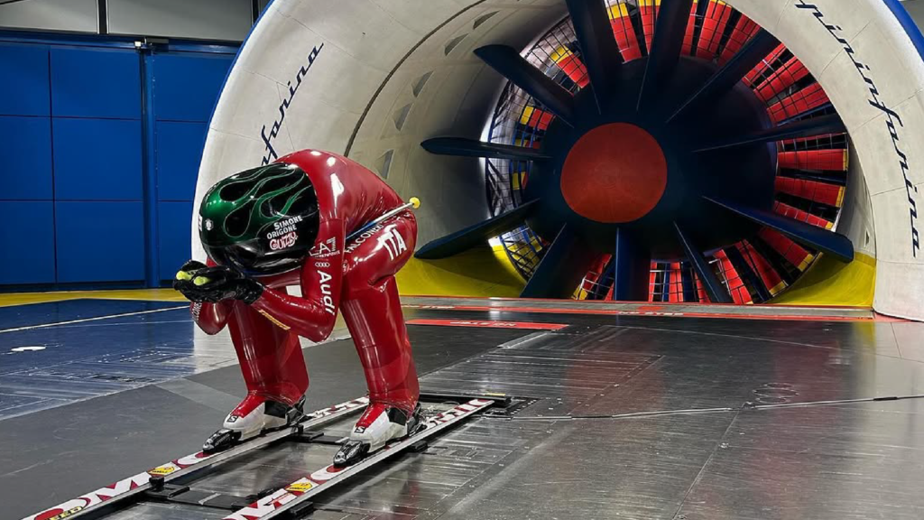 Simone Origone in tuck position during wind tunnel aerodynamic testing at the Pininfarina facility in Italy